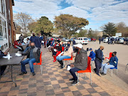Teachers and support staff queuing to be screened before receiving their jabs at the Rabasotho community centre in Thembisa.