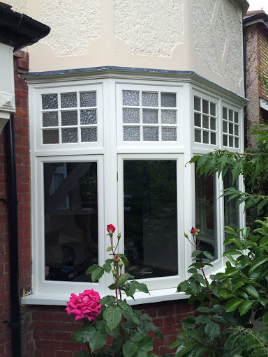 restored Bay window frame with new hardwood double glazed casement leafs fitted