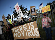 Anti-vaccine campaigners, such as those who recently protested outside Groote Schuur Hospital in Cape Town, should face prosecution, says health minister Joe Phaahla. File photo.