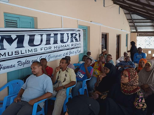 Lamu residents during an awareness campaign meet on child rights by MUHURI on Monday.