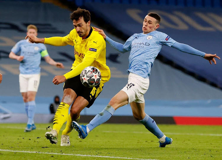 Borussia Dortmund's Mats Hummels in action with Manchester City's Phil Foden in their Champions League quarterfinal, first leg at Etihad Stadium, Manchester on April 6, 2021