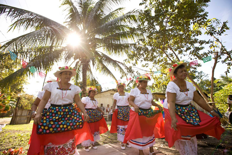 Dancers in Orange Walk Town, Belize.