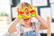 Finger painting is a wonderful sensory activity to do with your children.