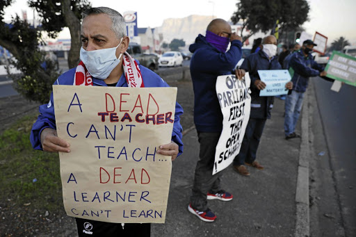 Teachers protest in Athlone, Cape Town, against the opening of schools this month. Tomorrow grade 7 pupils are expected to join matrics when classes resume.