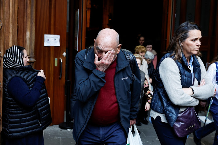 A man reacts while leaving a mass by the Bishop of Bilbao, Joseba Segura and priest Josu Lopez Villalba, a victim of sexual abuse, where forgiveness was asked for from victims of sexual abuse by the Catholic Church, in Bilbao, Spain, March 24, 2023.