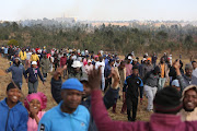 Mohlakeng, Randfontein residents gathered to hunt for zama zamas. 