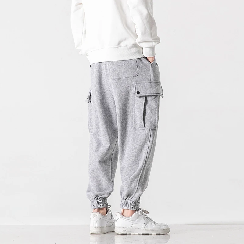 Salopettes japonaises unies et pantalons de survêtement, leggings de marque tendance pour adolescents, confortables et stylés au quotidien.
