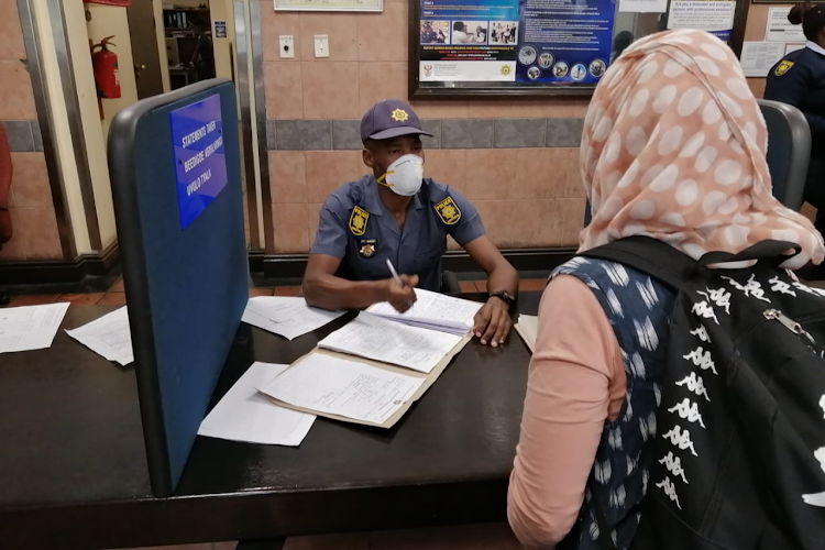 A police officer at Cape Town Central police station.