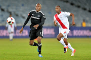 Sifiso Mbhele of Free State and Tendai Ndoro of Orlando Pirates during the Absa Premiership match between Orlando Pirates and Free State Stars at Orlando Stadium on November 19, 2016 in Soweto, South Africa.