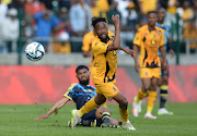 Mduduzi Mdantsane of Kaizer Chiefs is tackled by Keanu Cupido of Cape Town City in their MTN8 quarterfinal at Athlone Stadium in Cape Town on August 13 2023.