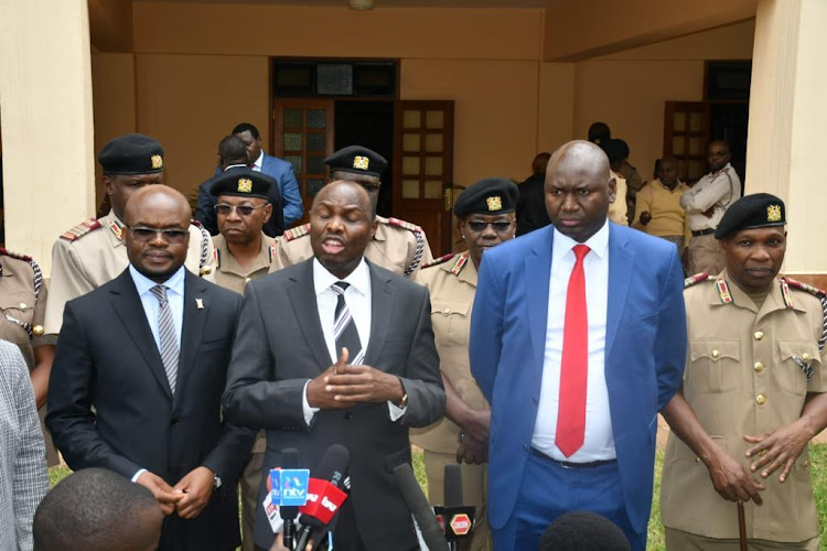 Chief of Staff and Head of Public Service Felix Kosgei briefs the media moments after addressing Regional, County and Sub-County Commissioners at the Kenya School of Government, Kabete. With him is Interior PS Raymond Omollo and his Immigration counterpart Julius Bitok