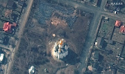 A satellite image shows the grave site with an approximately 13.7m-long trench in the southwestern section of the area near the Church of St Andrew and Pyervozvannoho All Saints, in Bucha, Ukraine, on March 31 2022. 