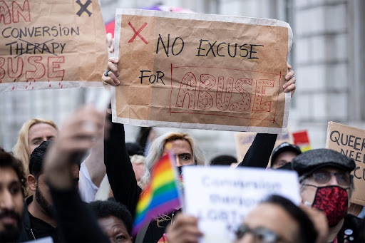 More than 80 organizations pulled out of the UK government’s international LGBTQ conference due to be held in June after Boris Johnson dropped a plan to ban so-called conversion therapy for transgender people.