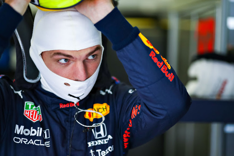 Max Verstappen prepares to drive in the garage during practice ahead of the F1 Grand Prix of Austria at Red Bull Ring on July 2 2021 in Spielberg.