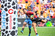 Duncan Matthews of the Lions outruns Rosko Specman of the Bulls and score a try during the SuperHero Sunday match between Vodacom Bulls and Emirates Lions at FNB Stadium on January 19, 2020 in Johannesburg, South Africa. 