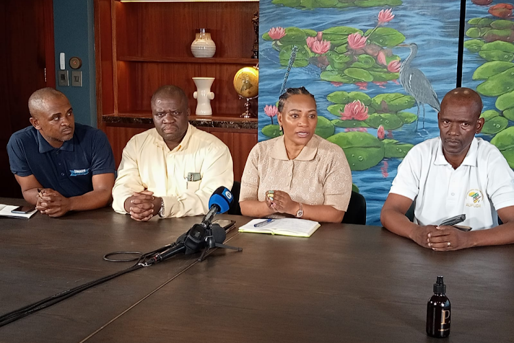 SA Funeral Practitioners Association chair Nomfundo Mcoyi and fellow leaders of the funeral sector at a media briefing in Durban on April 22 2022.