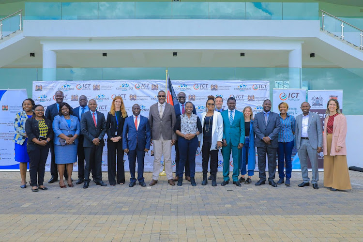 ICT and Digital Economy CS Eliud Owalo poses for a photo alongside other government officials, summit sponsors and partners at Uhuru Gardens in Nairobi