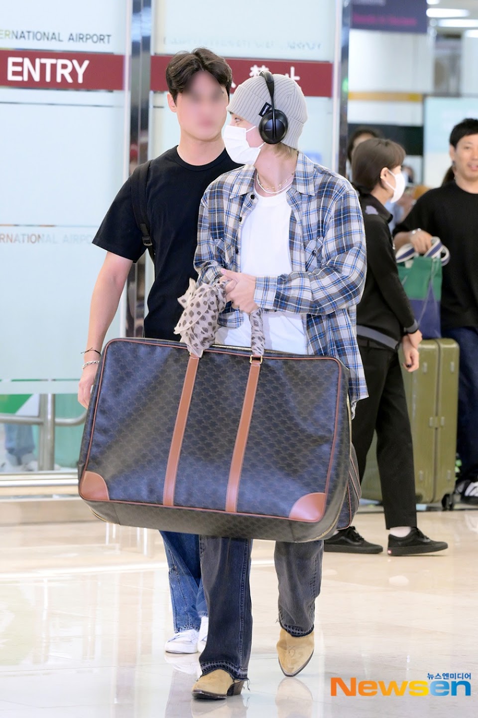 BTS's V Turns Heads At The Airport With His Visuals, But His Bag