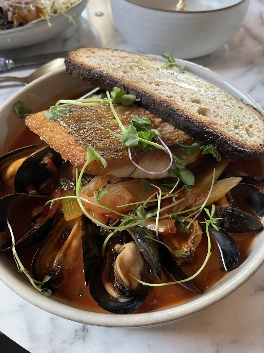 Red snapper with mussels and sourdough bread.