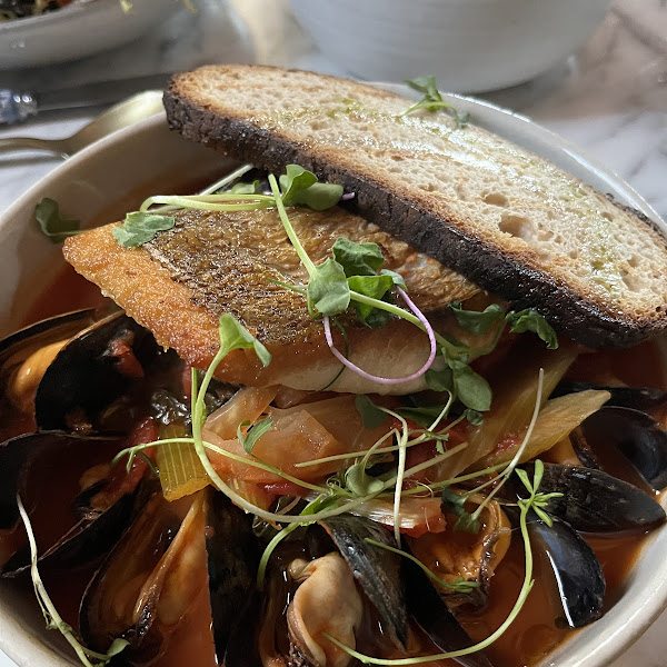 Red snapper with mussels and sourdough bread.