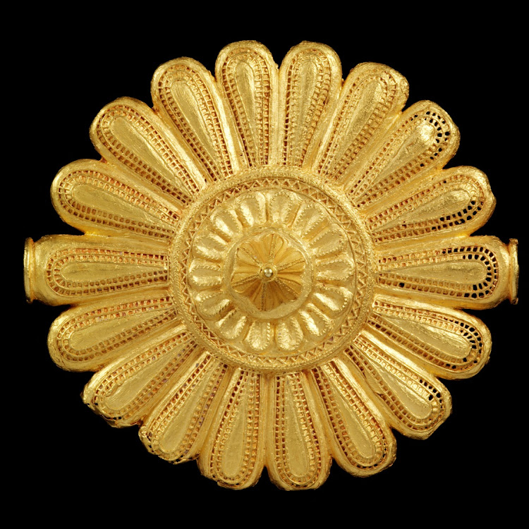 A cast gold badge, worn by the Asantehene's (king's) 'soul washer' as a badge of office in Ghana, before 1874.