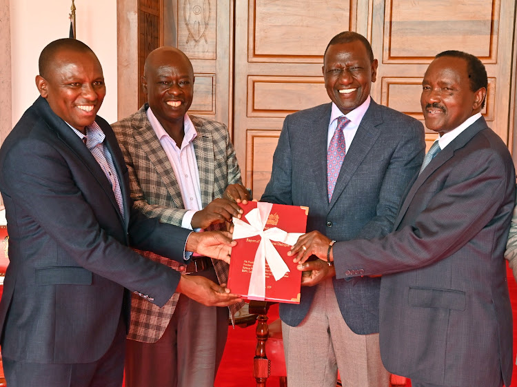 Leader of Majority at the National Assembly Kimani Ichung’wa, Deputy President Rigathi Gachagua, President William Ruto and Wiper Leader Kalonzo Musyoka with a copy of the report of the National Dialogue Committee on March 8, 2024.