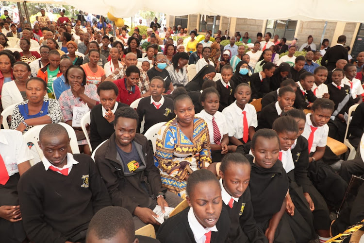 Parents, guardians and students during a thanks giving day at Athi River secondary school in his constituency within Machakos County on June 2, 2023.