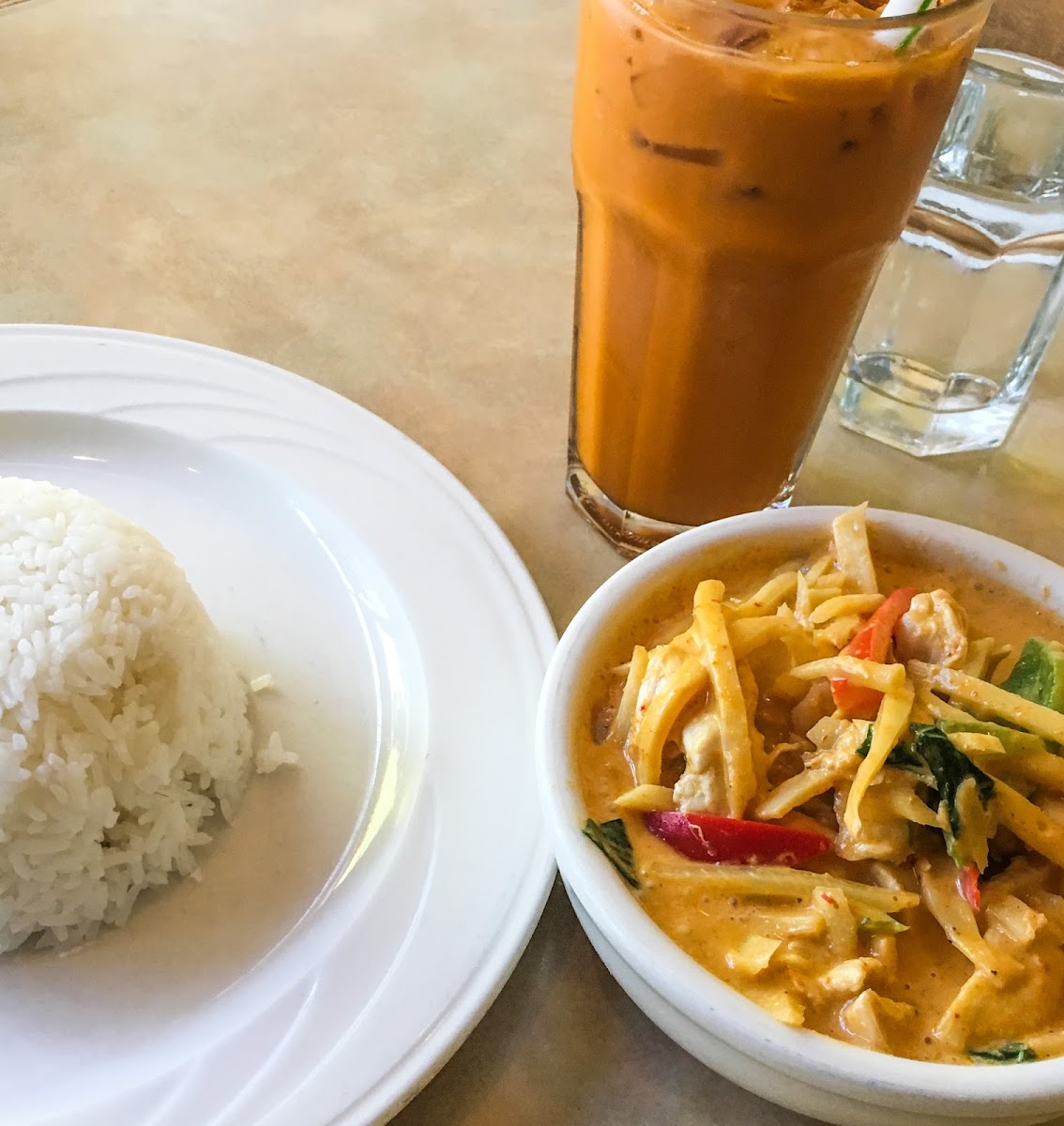 Red Curry and Thai Iced Tea from Galanga Thai Cuisine.