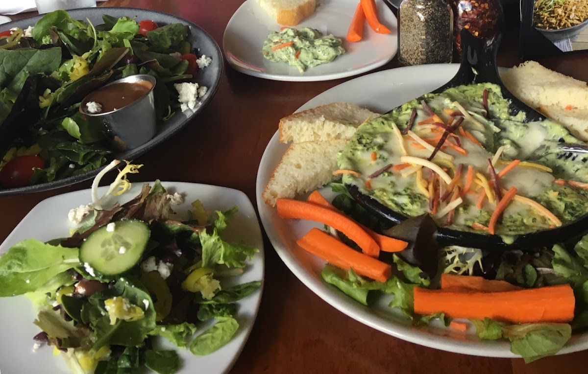 Greek salad and spinach artichoke dip