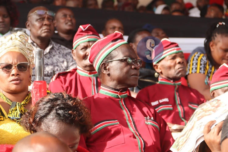 A section of the public dressed in attires symbolizing the four Kenyan flag colours at the Embu Moi Stadium on June 1, 2023