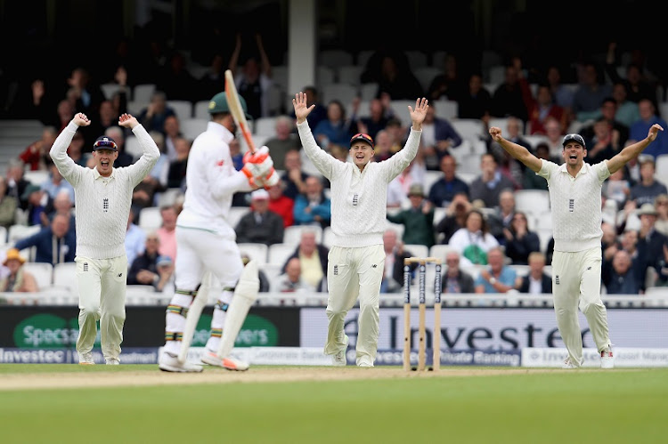 Keaton Jennings, Joe Root and Alastair Cook of England celebrate the wicket of Heino Kuhn of South Africa, trapped Ibw by Toby Roland-Jones, during Day Two of the 3rd Investec test match between England and South Africa at The Kia Oval on July 28, 2017 in London, England.