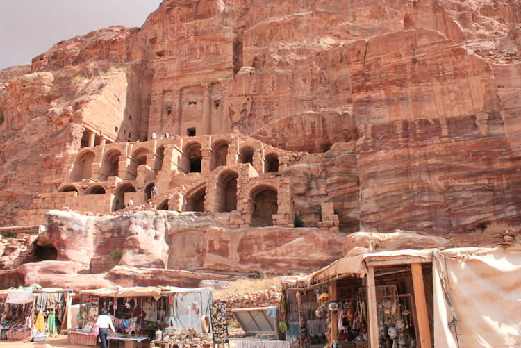 Petra, a site in Jordan's southwestern desert that dates to 300 B.C., features tombs and temples carved into pink sandstone cliffs.