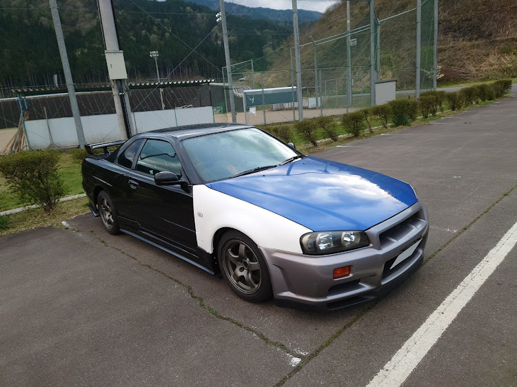 【新品未使用】R34 スカイライン GT-R ヘッドライトブラケット 左側 純正