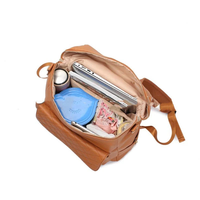 Mommy Bag met bijpassende luiermat en rugzak. Alles wat je nodig hebt voor je baby, georganiseerd en stijlvol. Ideaal voor moderne moeders.