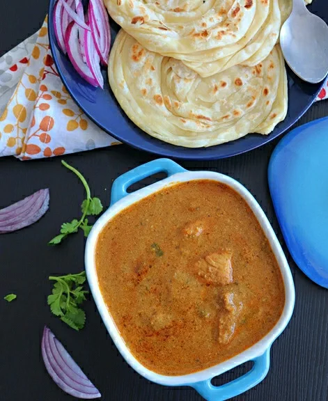 Parotta And Kozhi Varutharacha Curry