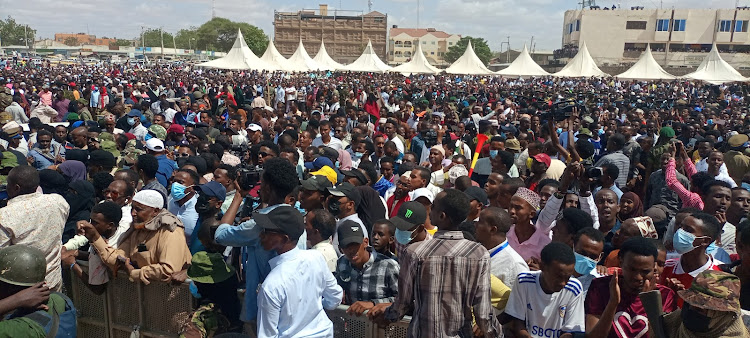 hundreds of residents of Garissa follow proceedings during the swearing in ceremony of Garissa governor Nathif Jama.