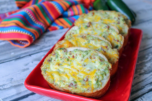 A tray of jalapeno popper toasts.