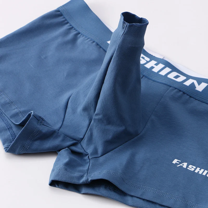 Heren katoenen ondergoed, middelhoge taille, effen kleur, ademend, voor optimaal comfort. Ideaal voor dagelijks gebruik, fris gevoel gegarandeerd.