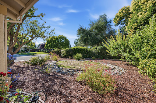Landscaped entrance with shrubs and trees - Buy this luxury property in Danville, 4 bedrooms