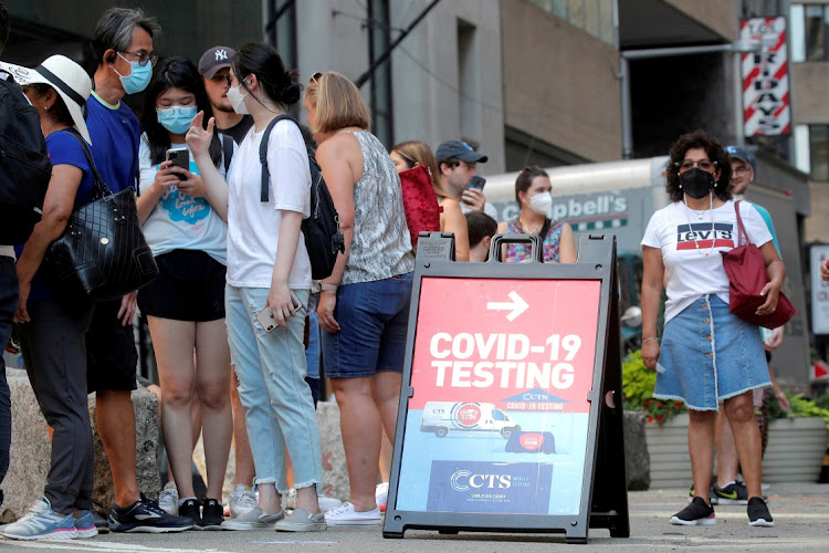 People line up at a coronavirus disease (Covid-19) testing at a mobile testing van in New York City, US.