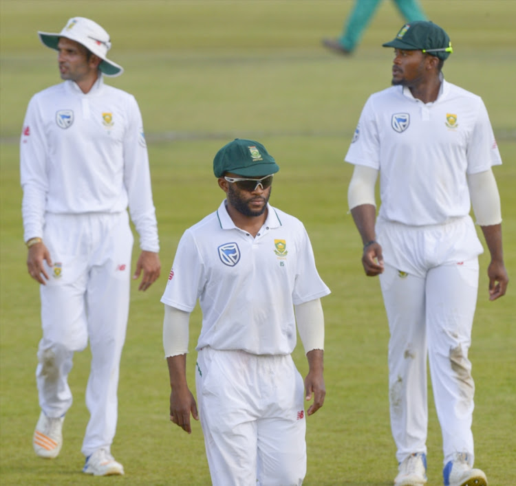 Temba Bavuma of South Africa, Keshav Maharaj of South Africa and Andile Phehlukwayo of South Africa during day 3 of the 1st Sunfoil Test match between South Africa and Bangladesh at Senwes Park on September 30, 2017 in Potchefstroom, South Africa.