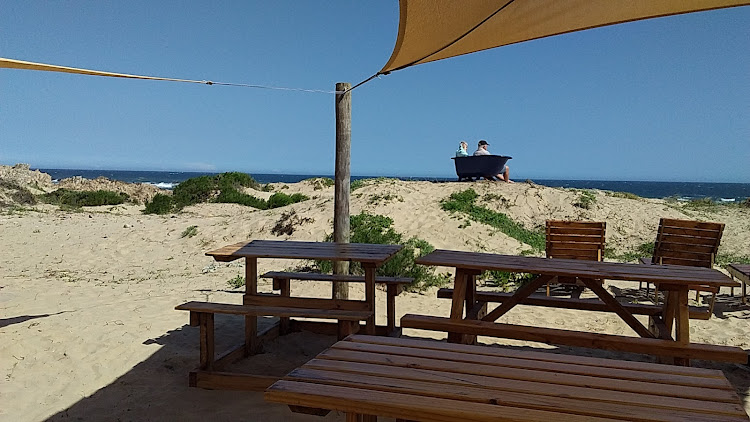 The Wildside Beach Restaurant in Buffalo Bay is a new kid on the block that ticks all the boxes. Make the most of the bath that has been converted into seating on the dunes