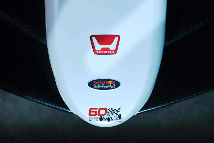 The livery includes a classic Honda "H" logo on the nose.
