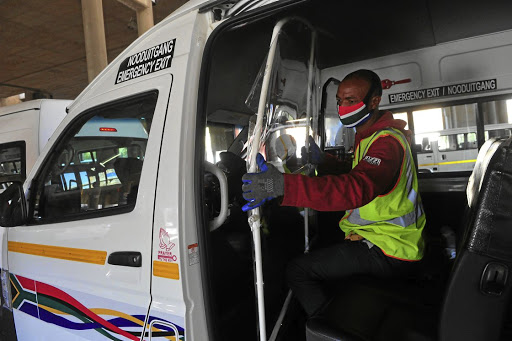 Thembelethu Mbukayo fits a taxi with Covid-compliant measures to ensure a safe passage to school/work.