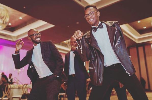 Black Coffee and his son Esona share a cute moment at his wedding earlier this year.