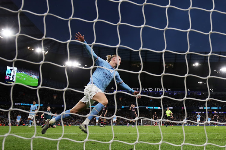 Manchester City's, Erling Haaland, celebrates the first of his three goals in his side's 6-0 win over Burnley in the FA Cup quarter-final on Saturday