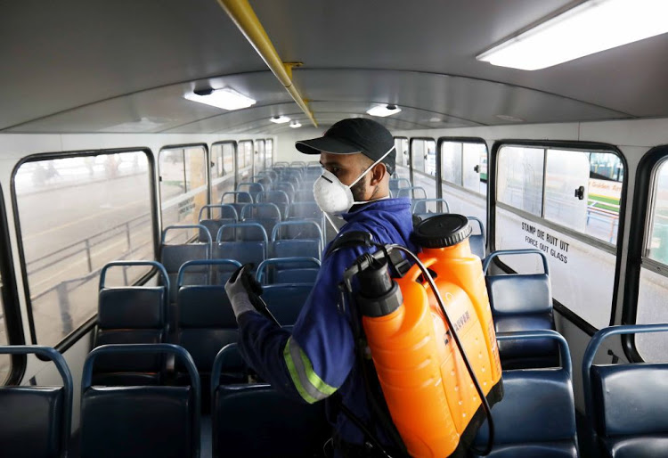 A bus being sanitised as part of the safety precautions taken for commuters using public transport. File photo.