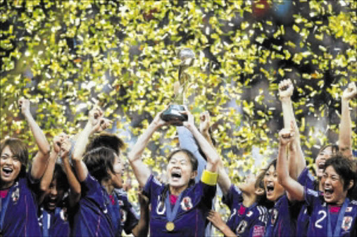 Japan's Nadeshiko soccer team, named after a frilly pink carnation, won the World Cup in Frankfurt, Germany, on Sunday night after a penalty shootout with the US to become the first Asian women's soccer world champions Picture: KAI PFAFFENBACH/REUTERS