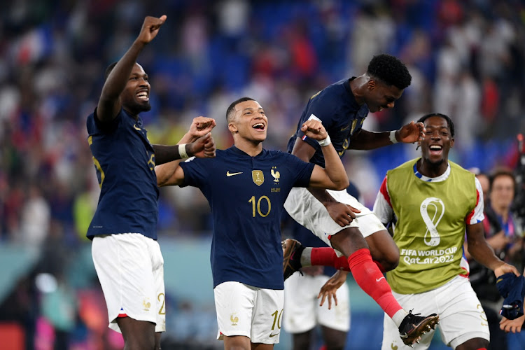 FILE IMAGE: Marcus Thuram and Kylian Mbappe of France celebrate after the 2-1 win during the FIFA World Cup Qatar 2022 Group D match against Denmark at Stadium 974 on November 26, 2022 in Doha, Qatar.