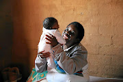 Elina Maseko   with her baby Precious at their RDP home in Mamelodi East. Maseko gave birth to the child  outside the Mamelodi Clinic in June. / SANDILE NDLOVU